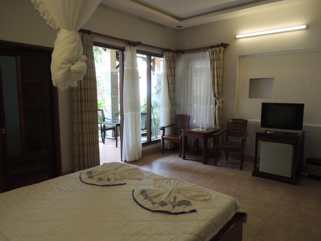 Ngoc Bich Bungalow Otel Phan Thiet Oda fotoğraf